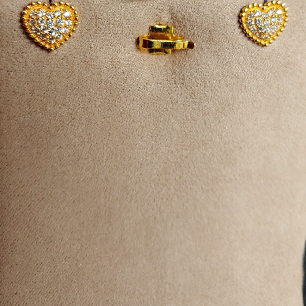 Heart gold earring.